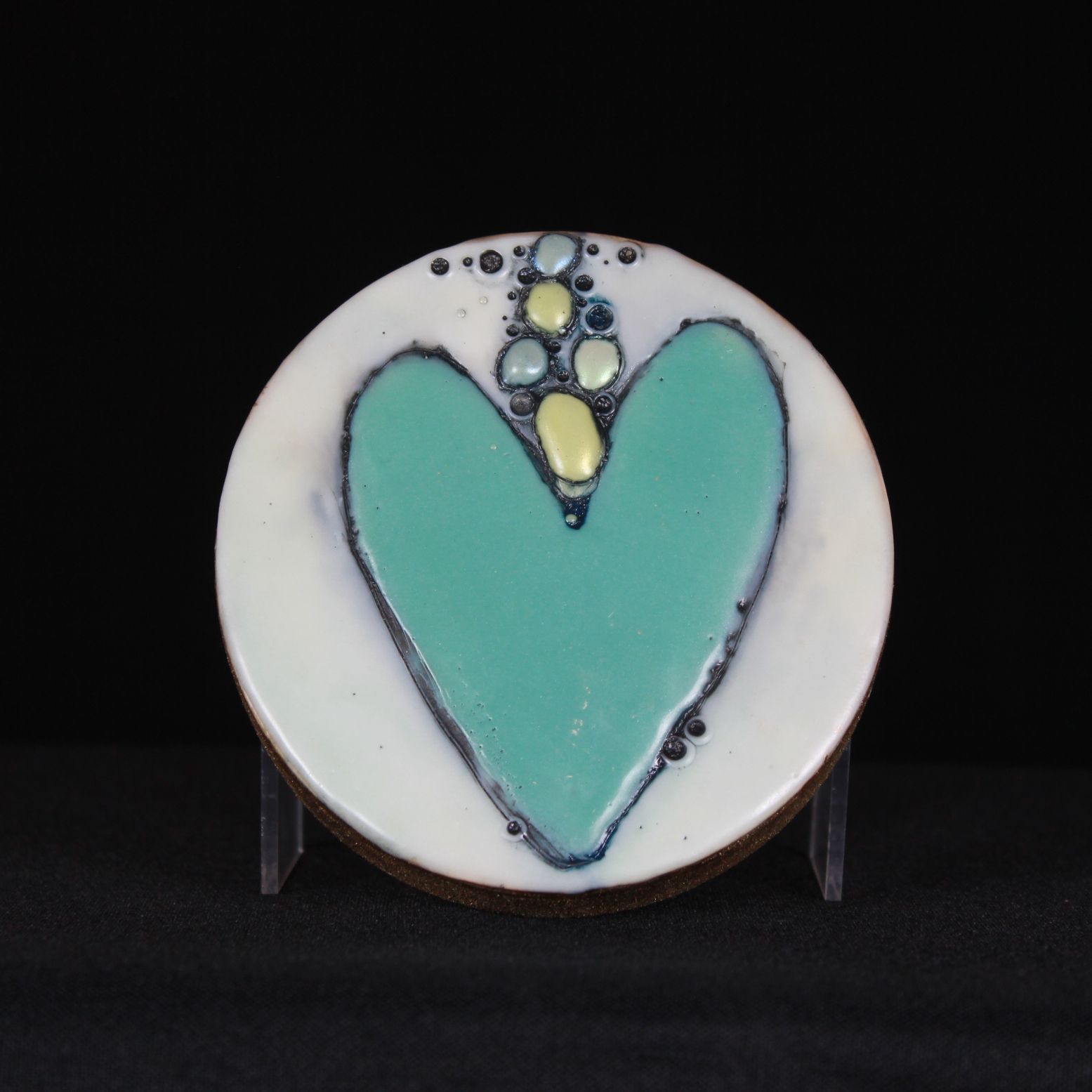 Circular Teal Heart with White