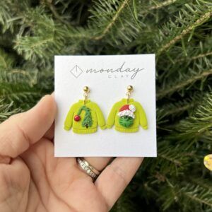 Grinch sweater dangle earrings by Monday Clay